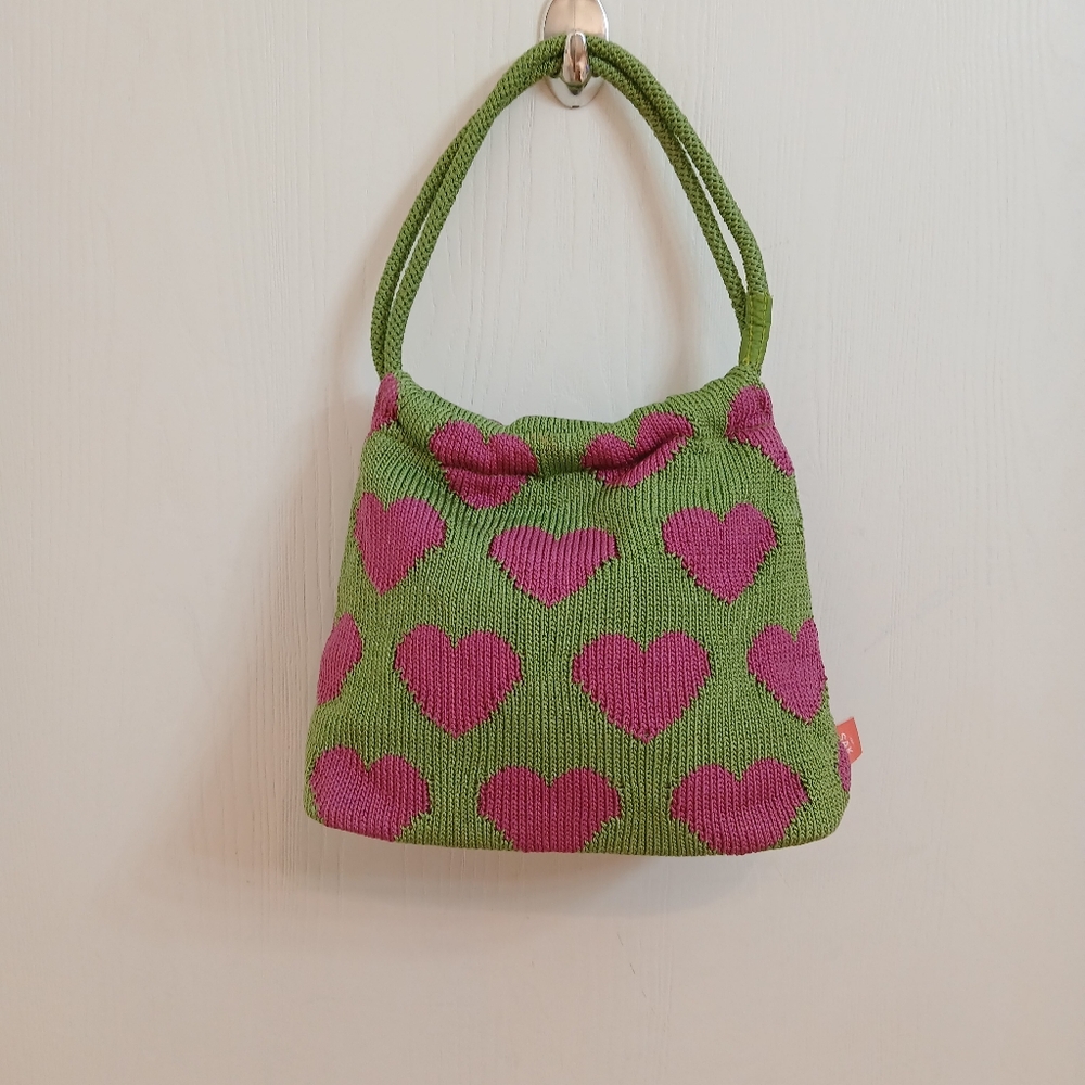 The Sak Pink And Green Tote With Crochet Texture.